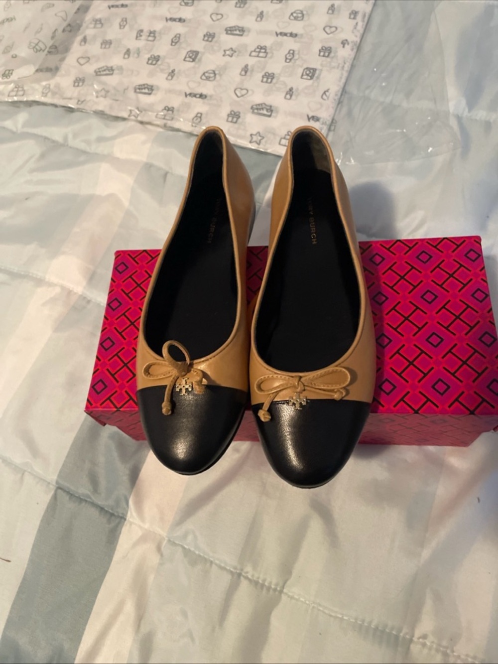 Tory Burch Tan and Black Cap-Toe Ballet Flats with Bow